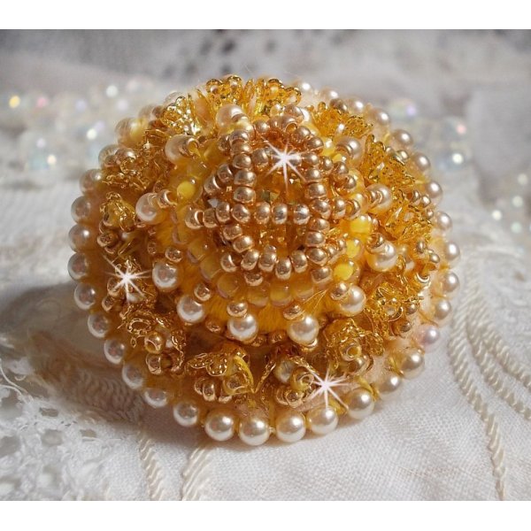 Buttercup ring embroidered with a Swarovski crystal and yellow DMC cotton
