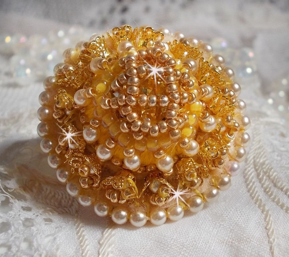 Buttercup ring embroidered with a Swarovski crystal and yellow DMC cotton