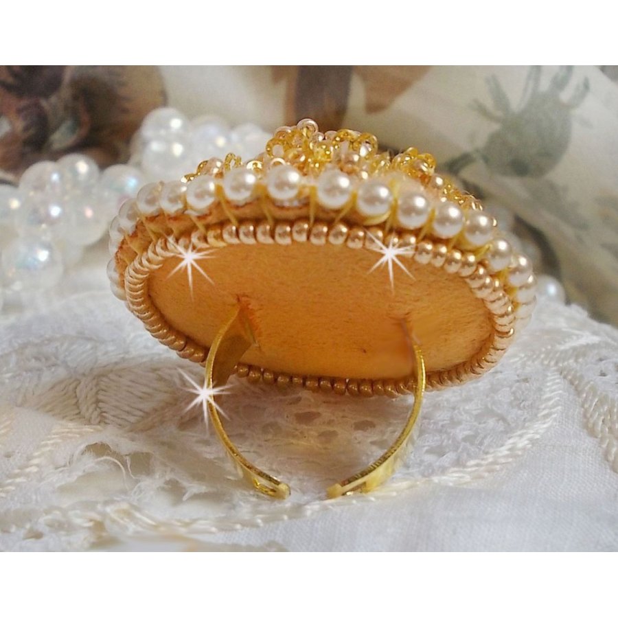 Buttercup ring embroidered with a Swarovski crystal and yellow DMC cotton