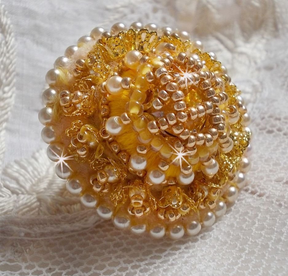 Buttercup ring embroidered with a Swarovski crystal and yellow DMC cotton