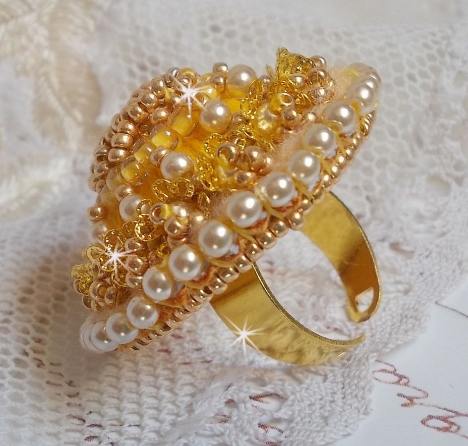 Buttercup ring embroidered with a Swarovski crystal and yellow DMC cotton