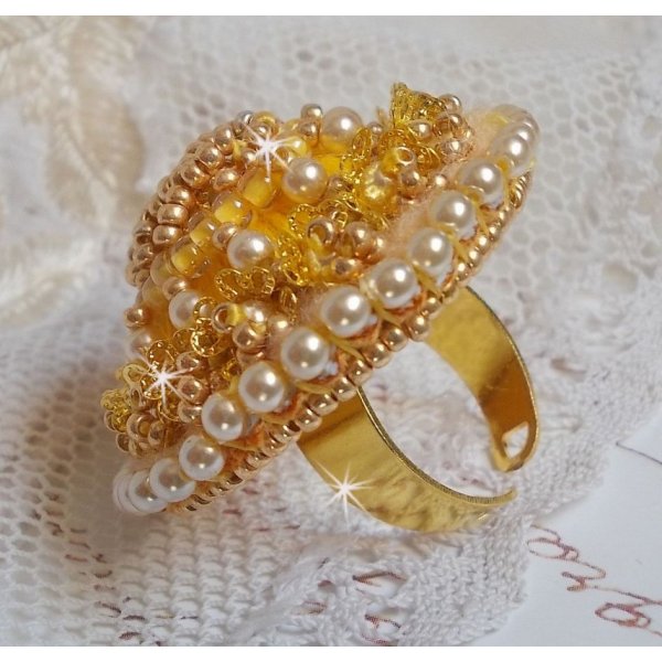 Buttercup ring embroidered with a Swarovski crystal and yellow DMC cotton