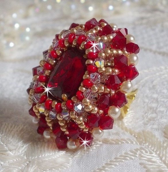 Ruby ring embroidered with a bohemian crystal cabochon