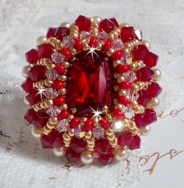 Ruby ring embroidered with a bohemian crystal cabochon