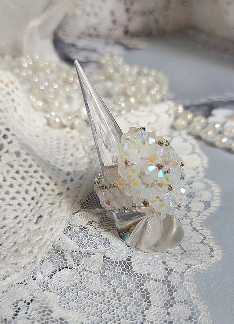 Crystal ring with facets and spinning tops in Swarovski crystal