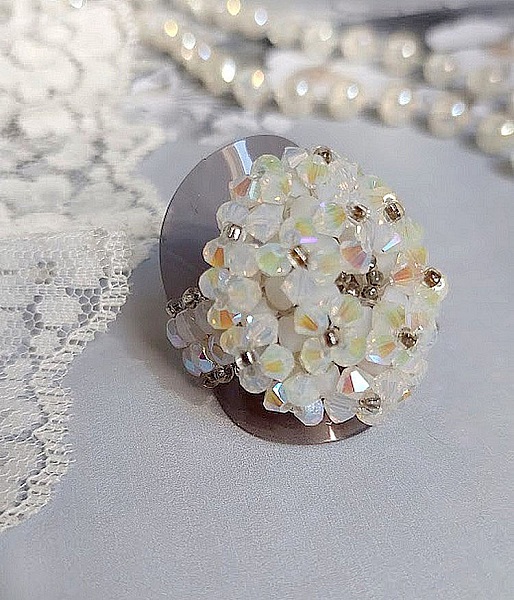 Crystal ring with facets and spinning tops in Swarovski crystal