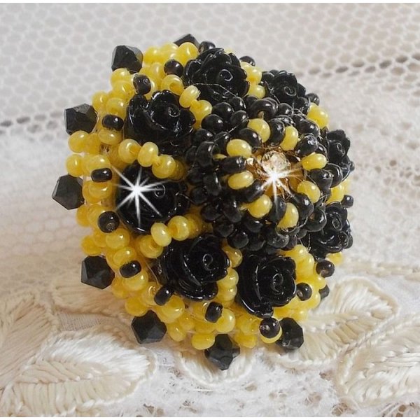 Dorine ring embroidered with black rose cabochons, a Crystal bezel and Jet and Yellow seed beads