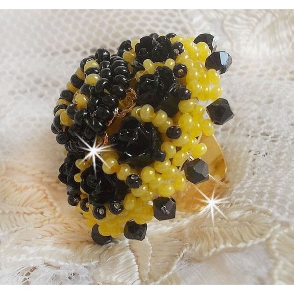 Dorine ring embroidered with black rose cabochons, a Crystal bezel and Jet and Yellow seed beads