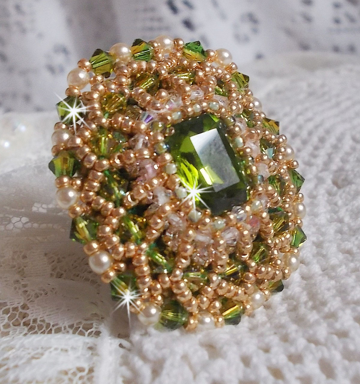 Garden Party ring embroidered with a 1960's bohemian crystal cabochon, Swarovski crystals, pearl beads and seed beads 