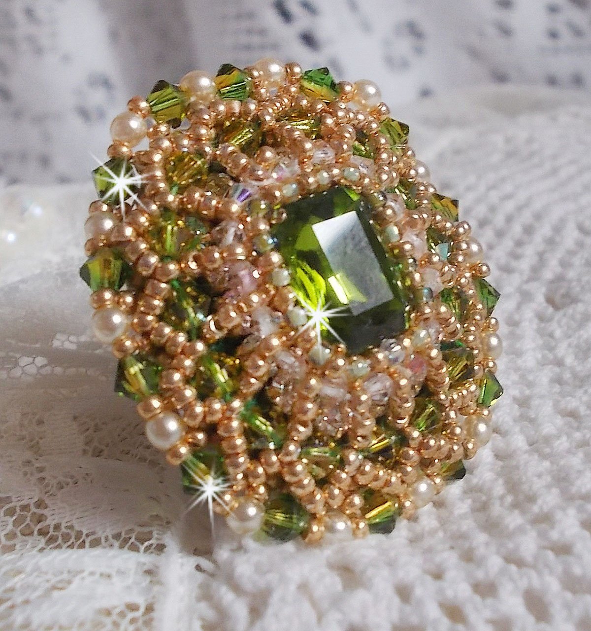 Garden Party ring embroidered with a 1960's bohemian crystal cabochon, Swarovski crystals, pearl beads and seed beads 