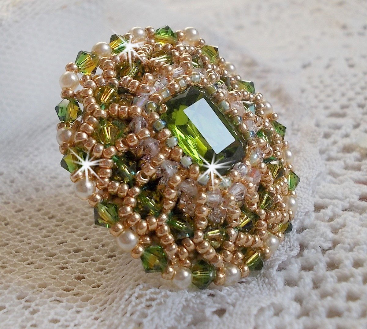 Garden Party ring embroidered with a 1960's bohemian crystal cabochon, Swarovski crystals, pearl beads and seed beads 