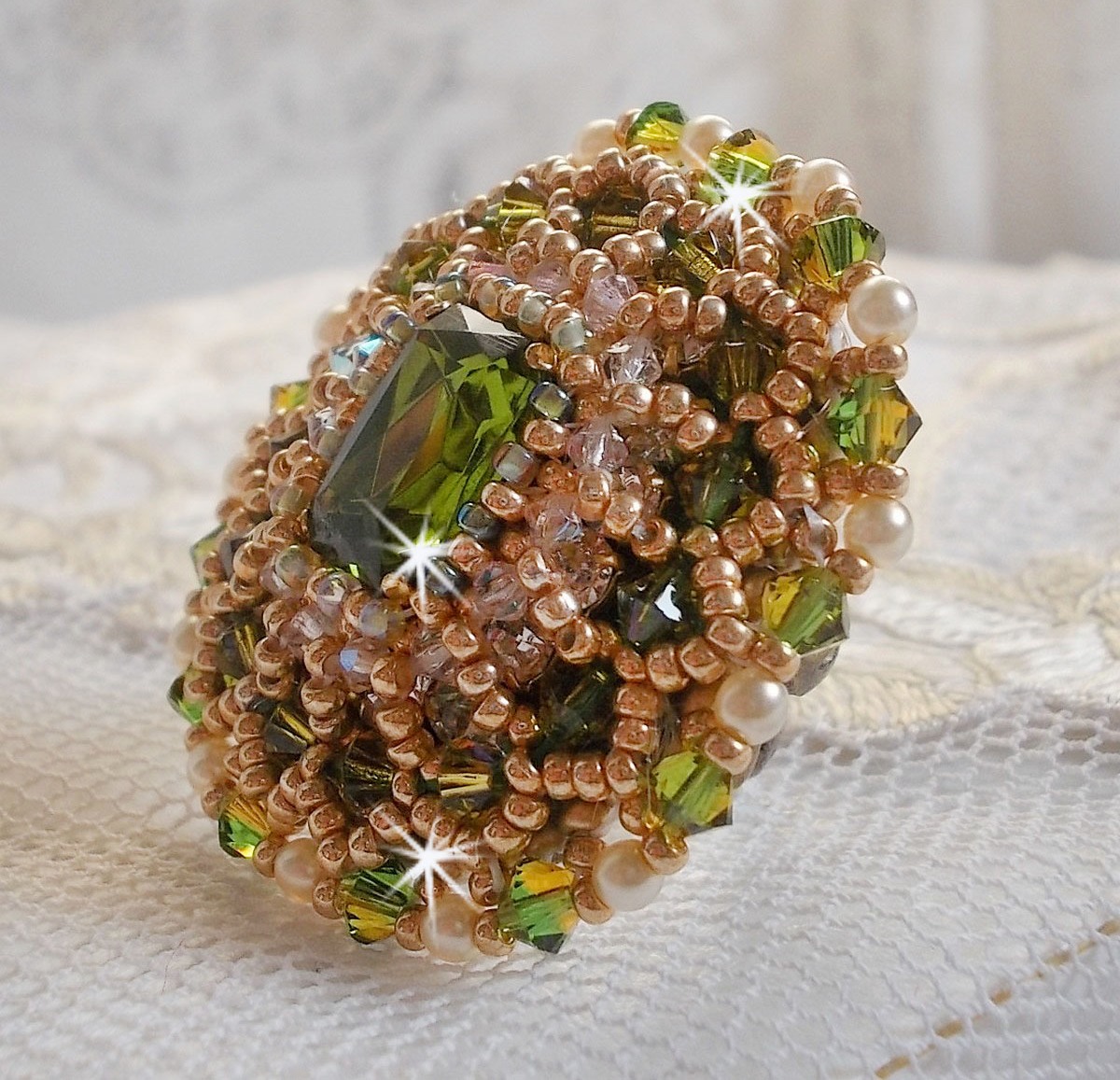 Garden Party ring embroidered with a 1960's bohemian crystal cabochon, Swarovski crystals, pearl beads and seed beads 