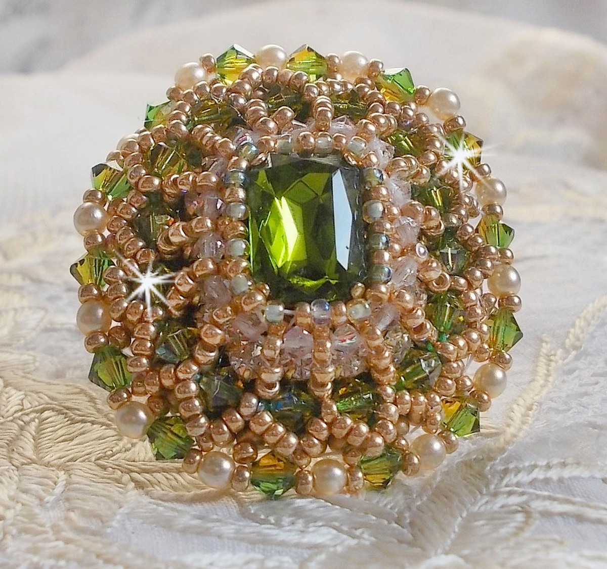 Garden Party ring embroidered with a 1960's bohemian crystal cabochon, Swarovski crystals, pearl beads and seed beads 