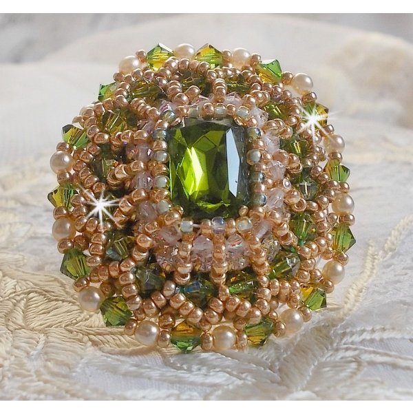 Garden Party ring embroidered with a 1960's bohemian crystal cabochon, Swarovski crystals, pearl beads and seed beads 