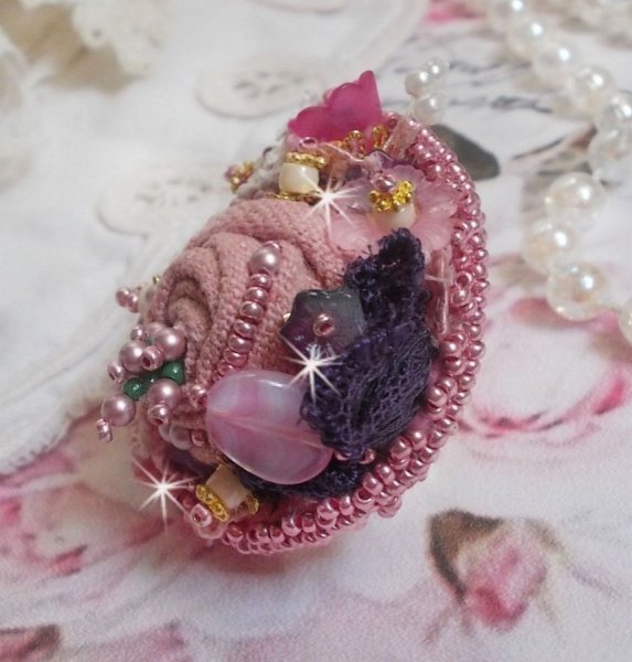 Poetic Garden ring embroidered with linen, fine lace, Swarovski crystals, Mother of Pearl leaf, Lucite flowers, glass beads and seed beads 
