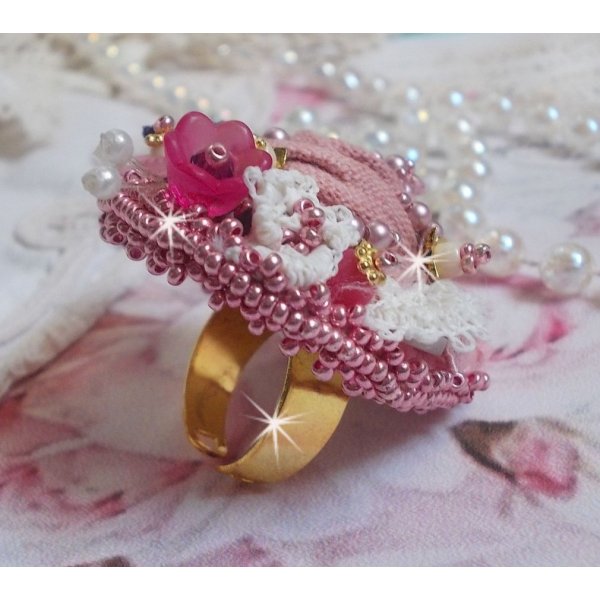 Poetic Garden ring embroidered with linen, fine lace, Swarovski crystals, Mother of Pearl leaf, Lucite flowers, glass beads and seed beads 