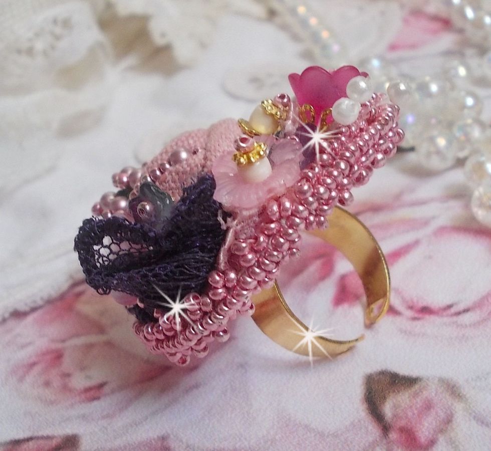 Poetic Garden ring embroidered with linen, fine lace, Swarovski crystals, Mother of Pearl leaf, Lucite flowers, glass beads and seed beads 