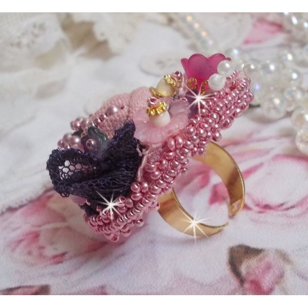 Poetic Garden ring embroidered with linen, fine lace, Swarovski crystals, Mother of Pearl leaf, Lucite flowers, glass beads and seed beads 