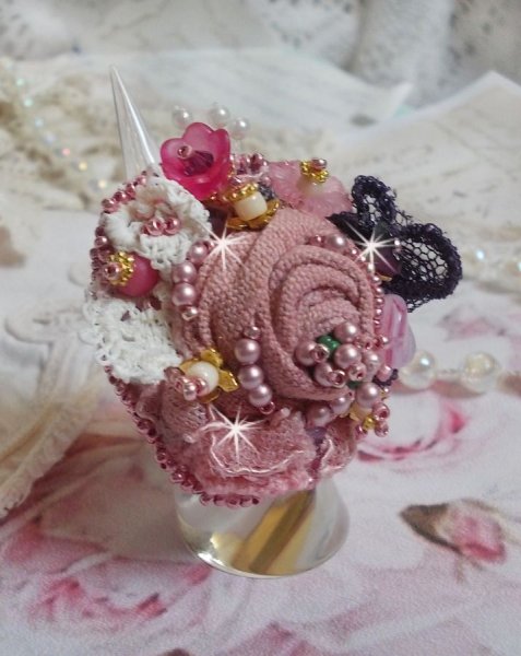 Poetic Garden ring embroidered with linen, fine lace, Swarovski crystals, Mother of Pearl leaf, Lucite flowers, glass beads and seed beads 