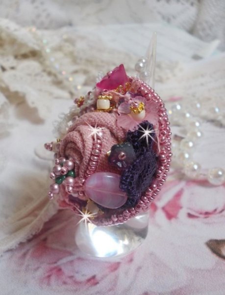 Poetic Garden ring embroidered with linen, fine lace, Swarovski crystals, Mother of Pearl leaf, Lucite flowers, glass beads and seed beads 