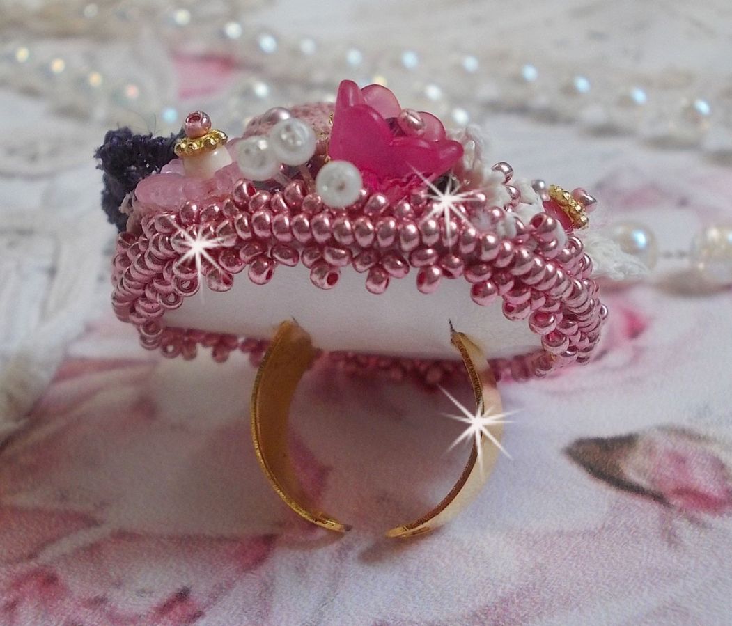 Poetic Garden ring embroidered with linen, fine lace, Swarovski crystals, Mother of Pearl leaf, Lucite flowers, glass beads and seed beads 