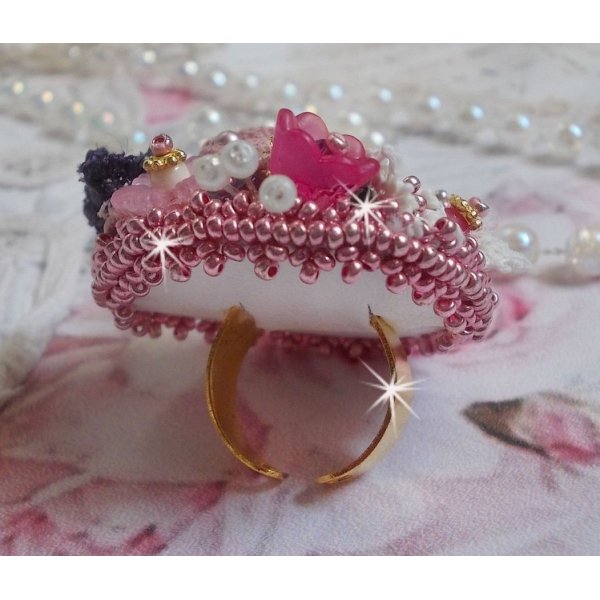 Poetic Garden ring embroidered with linen, fine lace, Swarovski crystals, Mother of Pearl leaf, Lucite flowers, glass beads and seed beads 