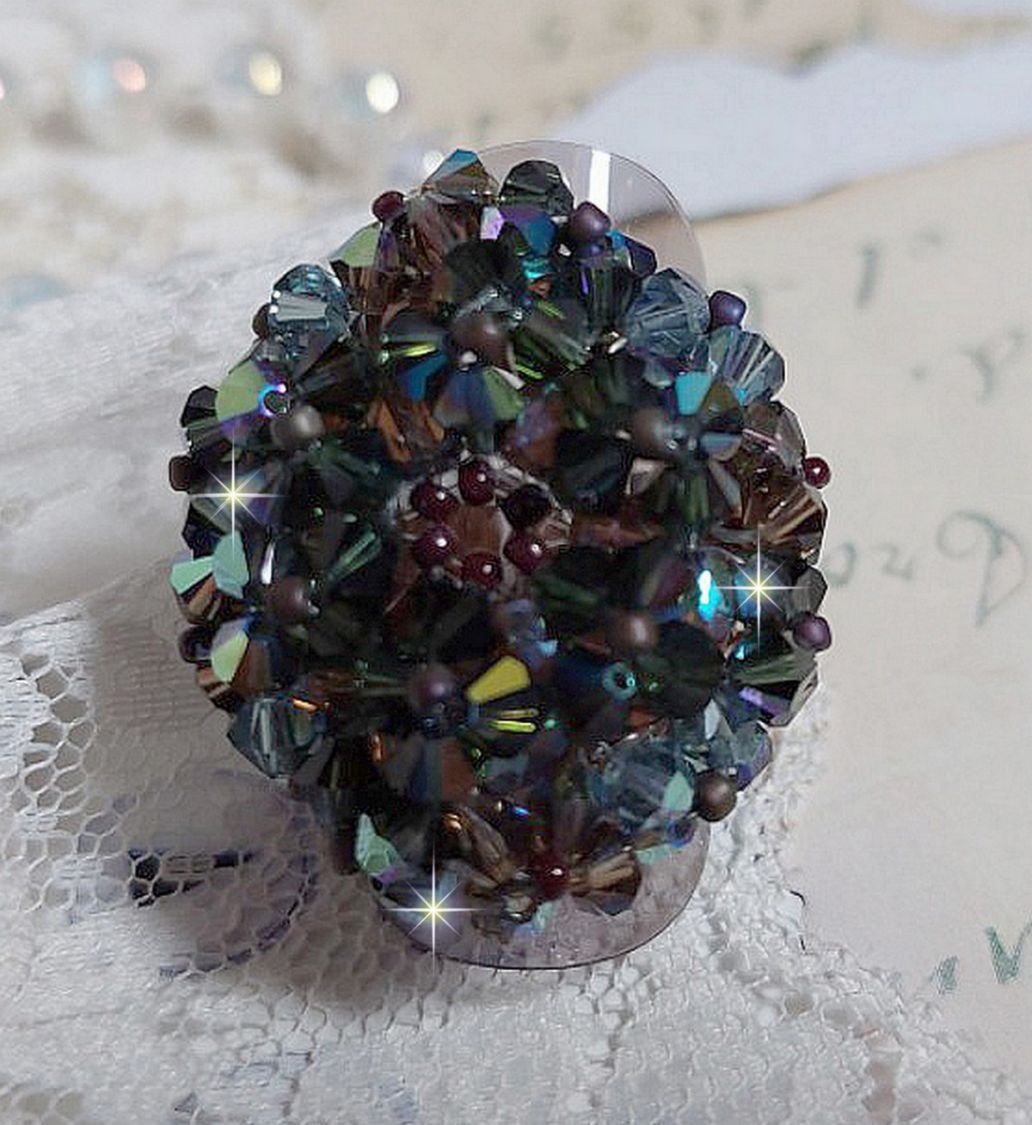 Long Brown Picasso ring created with faceted Swarovski crystals and spinners in Brown, Indian Sapphire and Turmaline AB quality with seed beads