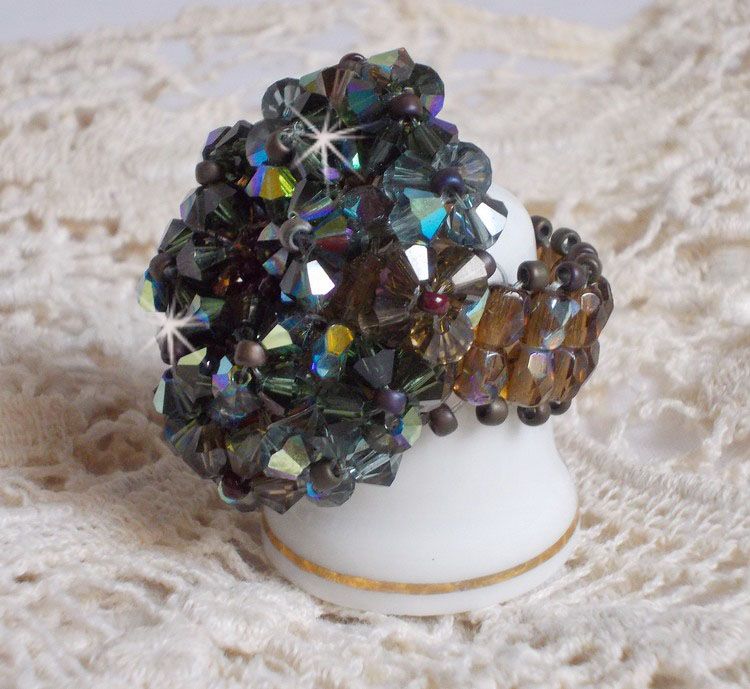 Long Brown Picasso ring created with faceted Swarovski crystals and spinners in Brown, Indian Sapphire and Turmaline AB quality with seed beads