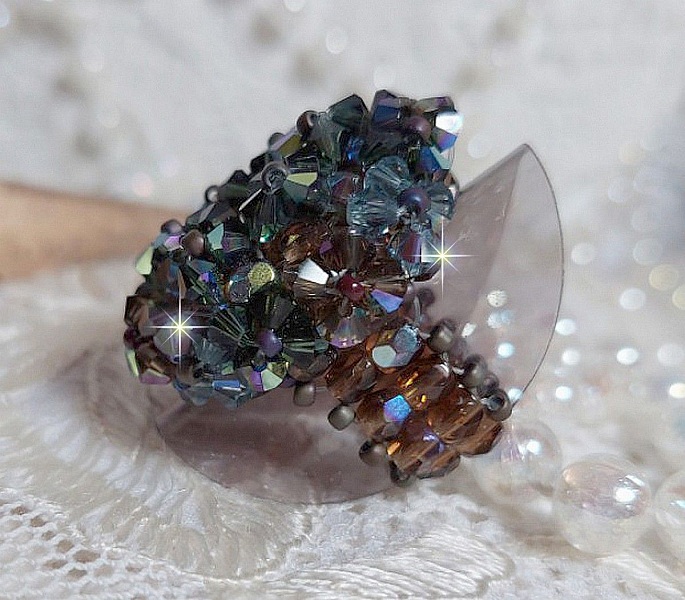 Long Brown Picasso ring created with faceted Swarovski crystals and spinners in Brown, Indian Sapphire and Turmaline AB quality with seed beads