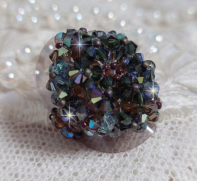 Long Brown Picasso ring created with faceted Swarovski crystals and spinners in Brown, Indian Sapphire and Turmaline AB quality with seed beads