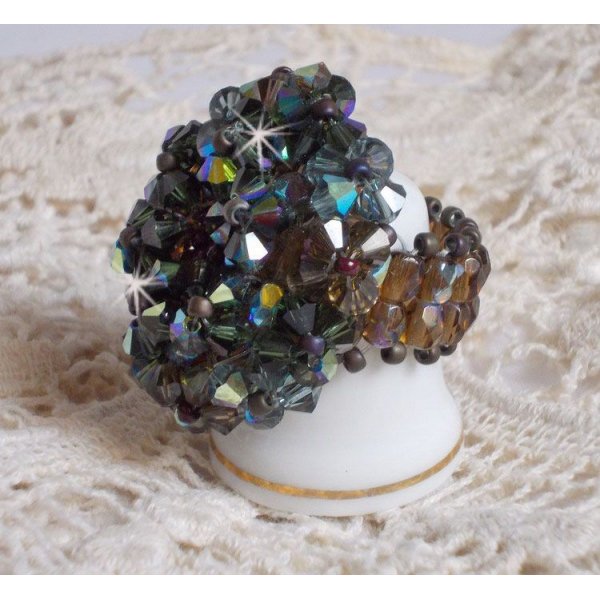 Long Brown Picasso ring created with faceted Swarovski crystals and spinners in Brown, Indian Sapphire and Turmaline AB quality with seed beads