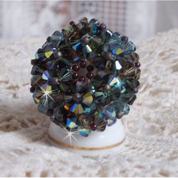 Long Brown Picasso ring created with faceted Swarovski crystals and spinners in Brown, Indian Sapphire and Turmaline AB quality with seed beads