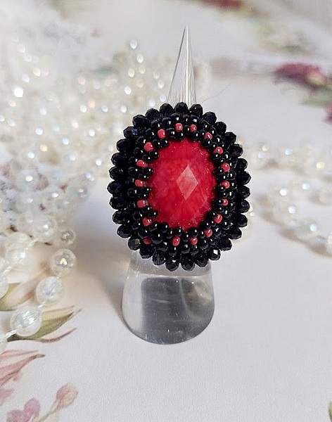 Midnight in Paris ring embroidered with a red faceted cabochon and black round beads