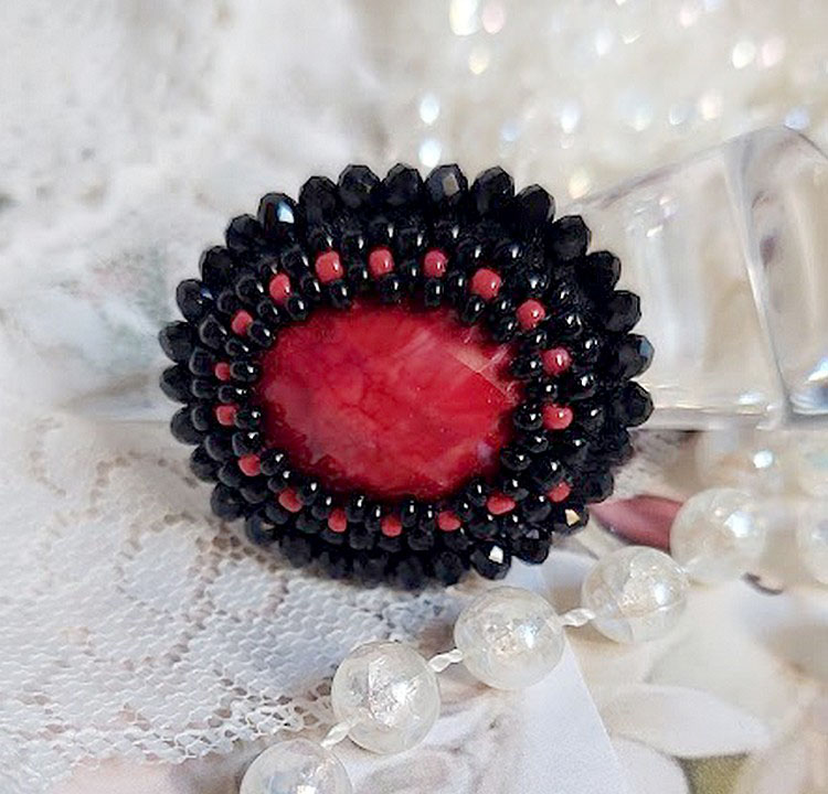 Midnight in Paris ring embroidered with a red faceted cabochon and black round beads