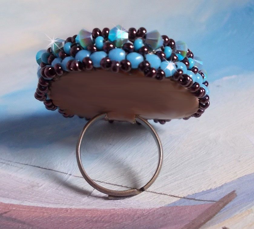 Naiad ring embroidered with a turquoise blue resin cabochon and crystal, a beautiful play of light.