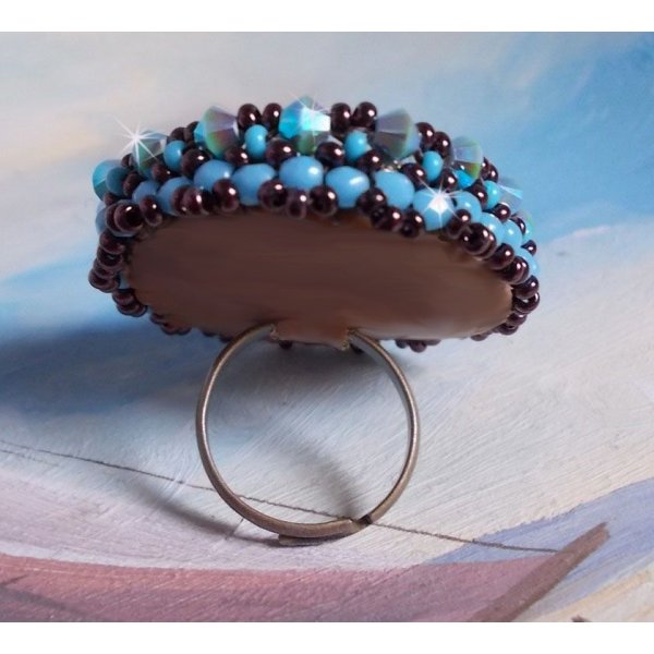 Naiad ring embroidered with a turquoise blue resin cabochon and crystal, a beautiful play of light.