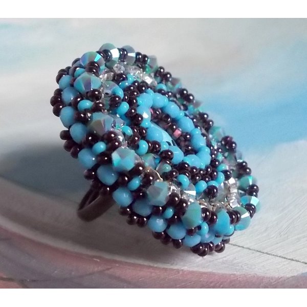 Naiad ring embroidered with a turquoise blue resin cabochon and crystal, a beautiful play of light.