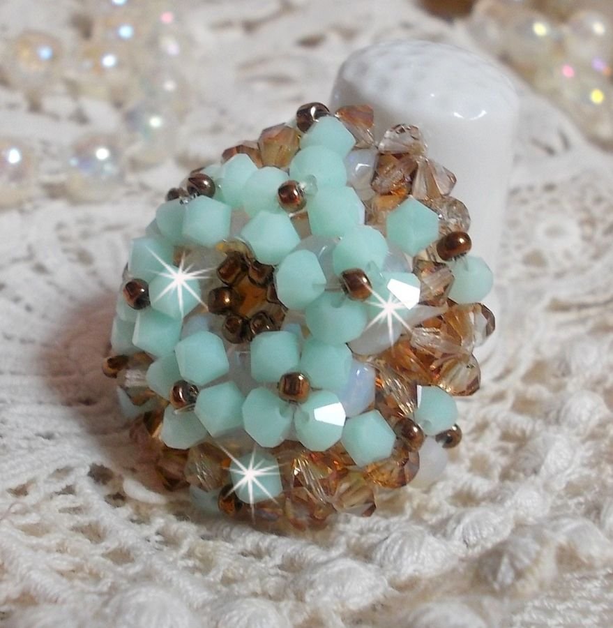 Water lily ring with facets and spinning tops in Swarovski crystal