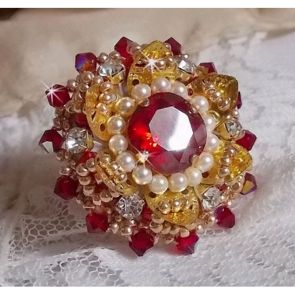 Ring L'Oiseau des Iles Rouge Dor&eacute; embroidered with pearly pearls, Swarovski crystals, a beautiful flower print and seed beads.