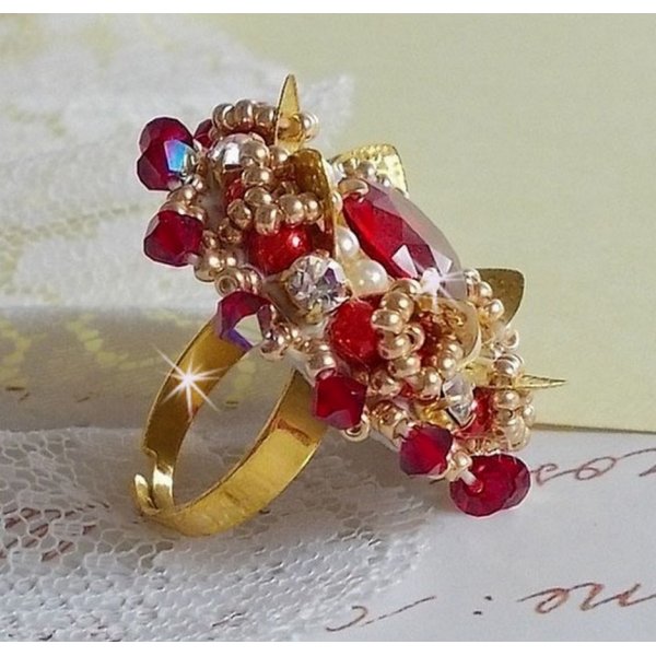 Ring L'Oiseau des Iles Rouge Dor&eacute; embroidered with pearly pearls, Swarovski crystals, a beautiful flower print and seed beads.