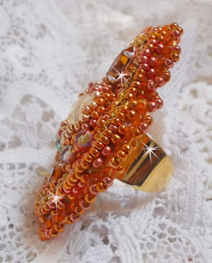 Rumba ring embroidered with a beautiful orange Swarovski crystal, facets and Miyuki beads