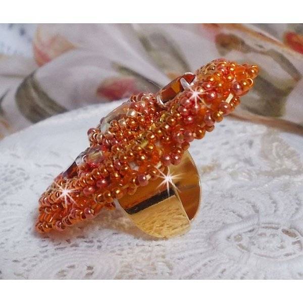 Rumba ring embroidered with a beautiful orange Swarovski crystal, facets and Miyuki beads