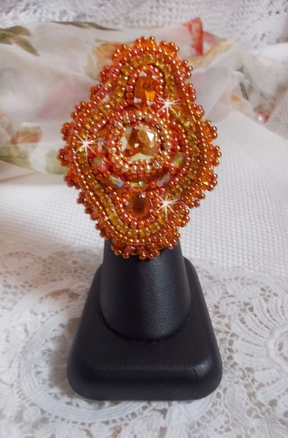 Rumba ring embroidered with a beautiful orange Swarovski crystal, facets and Miyuki beads