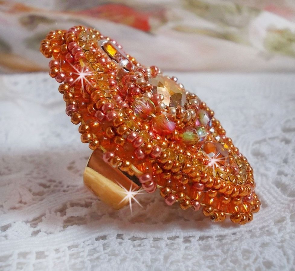 Rumba ring embroidered with a beautiful orange Swarovski crystal, facets and Miyuki beads