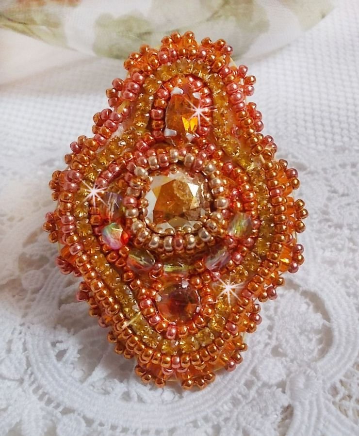 Rumba ring embroidered with a beautiful orange Swarovski crystal, facets and Miyuki beads