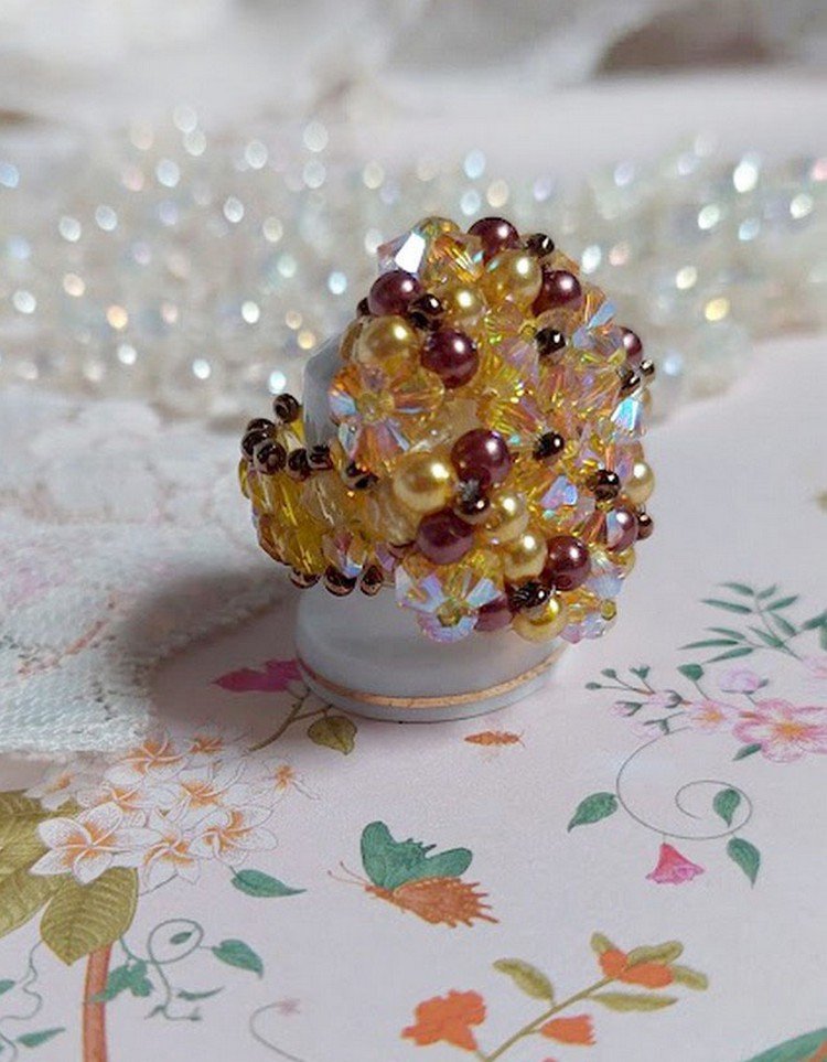 Sunshine ring with facets, pearls and Swarovski crystal spinners