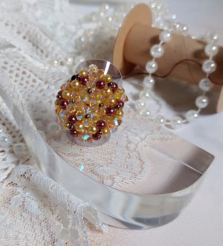 Sunshine ring with facets, pearls and Swarovski crystal spinners