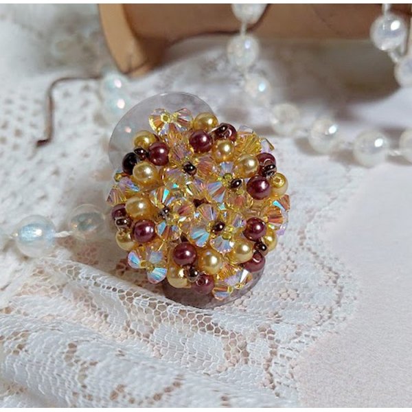 Sunshine ring with facets, pearls and Swarovski crystal spinners