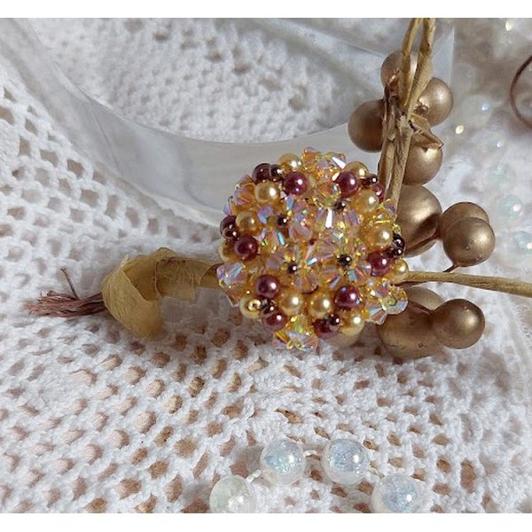 Sunshine ring with facets, pearls and Swarovski crystal spinners