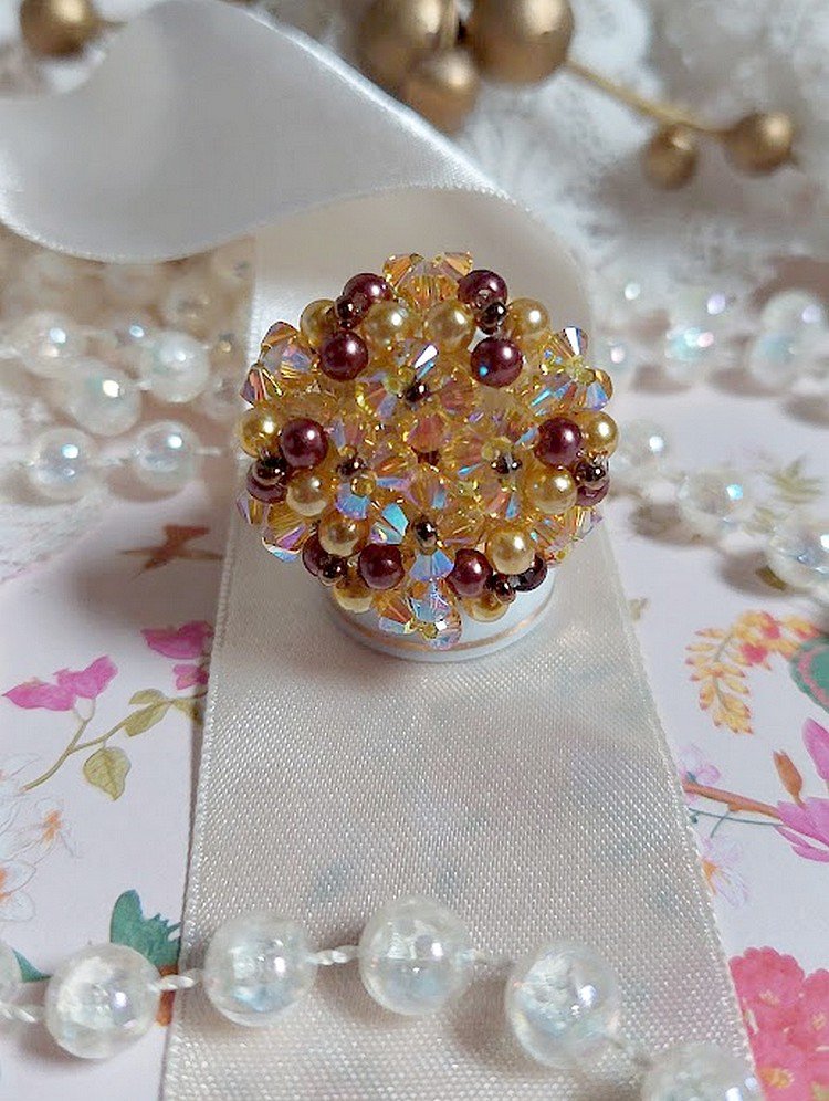 Sunshine ring with facets, pearls and Swarovski crystal spinners